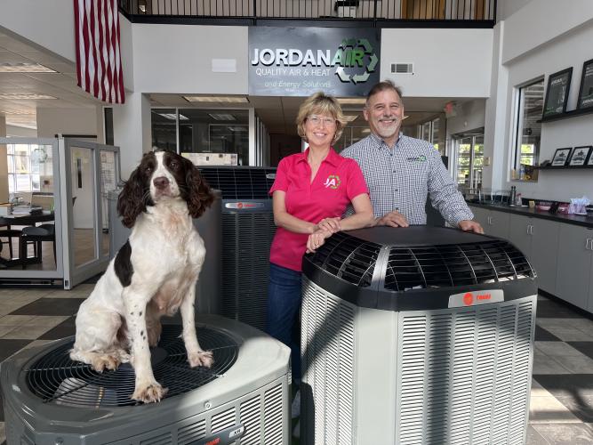 Carolyn and Donnie Jordan, with their dog Alice, moved Jordan Air to downtown Crawford in 2018. It has become one of Oglethorpe County’s largest private employers. (JESSE WOOD/THE OGLETHORPE ECHO)