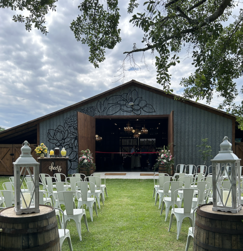 Owners Blake and Shannon Bailey renovated both barns and  installed 60 pallets of sod while transforming the Nix farm into The Grove at Bailey Farms, which is a working 45-acre farm and a wedding venue. (MCCAIN BRACEWELL/THE OGLETHORPE ECHO)