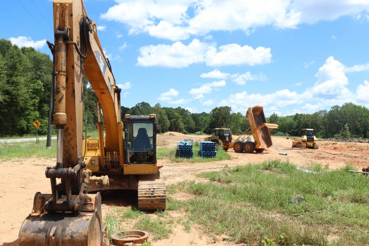 Construction equipment sits at one of the construction sites on Bunker Hill Road, near the intersection of Highway 78, in Crawford last week. Crawford Village, a multi-use development, and The Pines at Grove Creek are being built. (LANDEN TODD/THE OGLETHORPE ECHO)