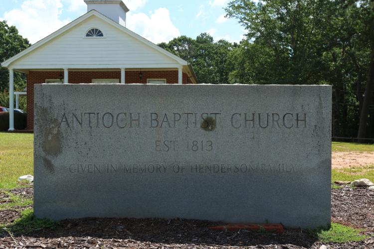 The sign in front of Antioch Baptist Church in Stephens states the church was established in 1813. The church celebrated its 210th anniversary this week with a special speaker on Sunday, a potluck lunch and three nights of revival. (LANDEN TODD/THE OGLETHORPE ECHO)
