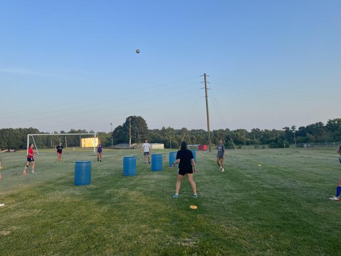 Members of the OCHS soccer teams play soccer volleyball as part of their summer training. Both the boys and girls teams also scrimmage on a weekly basis. (SUBMITTED PHOTO)
