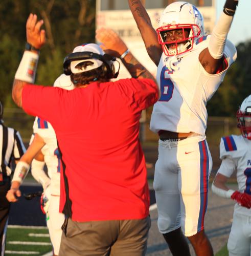 OCHS receiver Darius Heard (No. 6) can’t contain his enthusiasm after scoring on a 55-yard touchdown catch in a 14-7 loss to East Jackson last Friday. (DONNY FAUST/FOR THE OGLETHORPE ECHO)