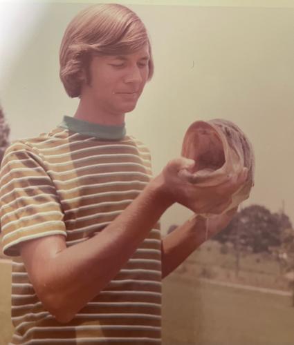 Tom Carter displays a fish he caught while growing up in Oglethorpe County. He was his senior class president at OCHS and worked at The Oglethorpe Echo. (SUBMITTED PHOTO)