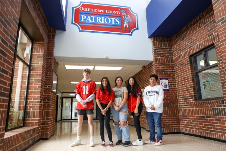 Oglethorpe County High School seniors (from left) Landon Quarles, Yanet Alvarez, Charlie Roberts, Michaela Watkins and Bryan Hernandez are part of Oglethorpe County's first graduating class of REACH scholars. (Photo/Cassidy Hettesheimer)