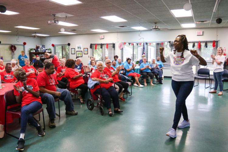 Sheryl Howard speaks to the red and blue teams prior to the game on Friday morning, Sept. 15, 2023. NBA All Star Dwight Howard hosted 'Family Feud' at the Oglethorpe Senior Center in Crawford, Georgia. (Photo/Sidney Chansamone)