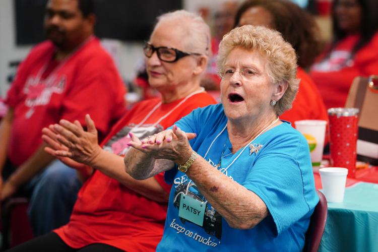 Patsy Cruce (right) cheers beside Cindy Lou Phelps during the round on Friday morning, Sept. 15, 2023. NBA All Star Dwight Howard hosted 'Family Feud' at the Oglethorpe Senior Center in Crawford, Georgia. (Photo/Sidney Chansamone)