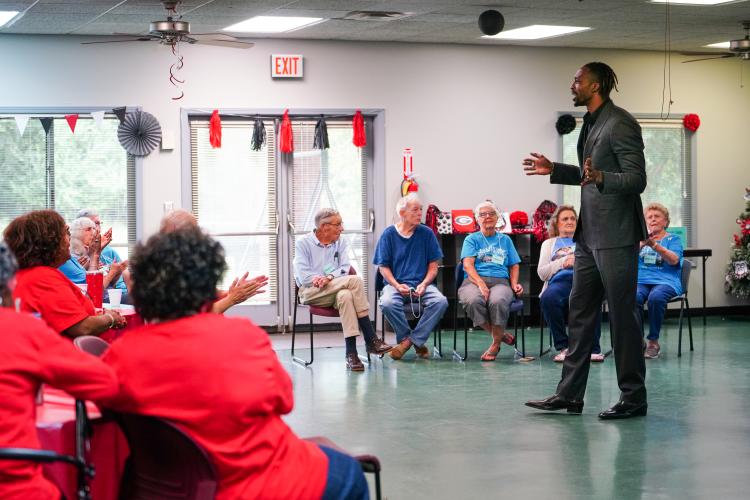 NBA All Star Dwight Howard leads the group on Friday morning, Sept. 15, 2023. Howard hosted 'Family Feud' at the Oglethorpe Senior Center in Crawford, Georgia. (Photo/Sidney Chansamone)