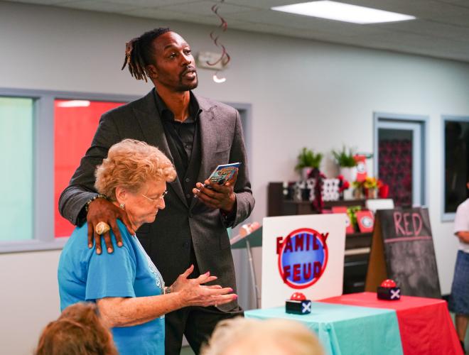 NBA All Star Dwight Howard awaits Patsy Cruce's answer on Friday morning, Sept. 15, 2023. Howard hosted 'Family Feud' at the Oglethorpe Senior Center in Crawford, Georgia. (Photo/Sidney Chansamone)