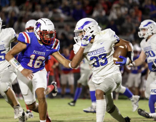 Oglethorpe County’s Quentin Nash tracks down Riverside Military Academy’s Jacques Chiller in the Patriots’ 57-0 homecoming victory on Friday night. OCHS had eight tackles for loss, two safeties and an interception. (NATHALEE SIMONEAU/THE OGLETHORPE ECHO)