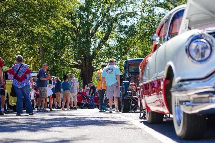 Attendees browse the vintage cars on display at the Firefly Cruise In. The event ran from 1-5 p.m. (Sidney Chansamone/The Oglethorpe Echo)