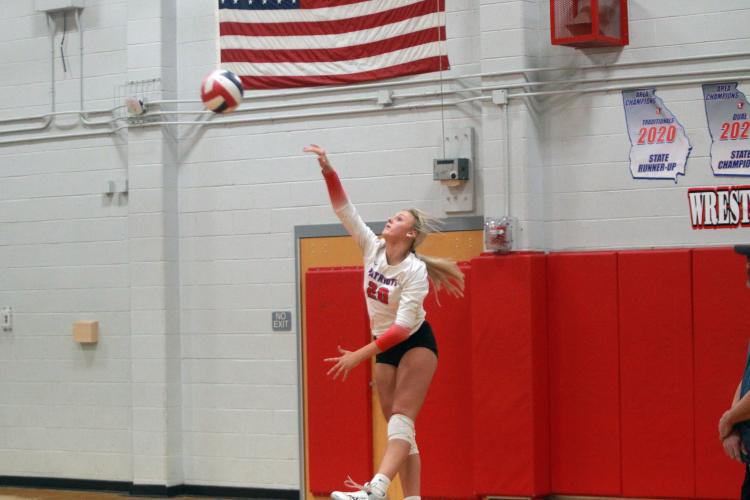 Madi Kelley serves the ball during Oglethorpe County’s 25-6, 25-10, and 25-15 victory over Greene County on Sept. 7. Kelley had nine kills and also had several aces in the final home match before a five-match road trip. (TREVYN GRAY/OGLETHORPE ECHO)