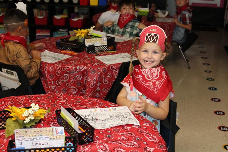 Angel Simpson’s kindergarten class worked on activities for the day in a farm theme. They learned to label parts of farm animals and color drawings with object finding tasks. (Photo/Caleb Baldwin)