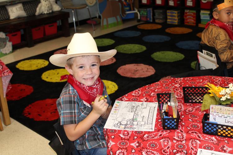 Angel Simpson’s kindergarten class worked on activities for the day in a farm theme. They learned to label parts of farm animals and color drawings with object finding tasks. (Photo/Caleb Baldwin)