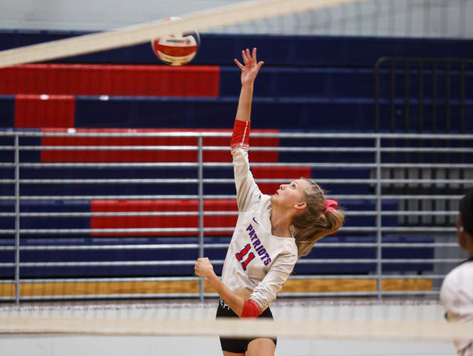 Senior Avery Kort returns the ball over the net in Oglethorpe County's first-round state playoff win over Rabun County on Wednesday, Oct. 18, 2023, in Lexington, Georgia (Photo/Cassidy Hettesheimer).