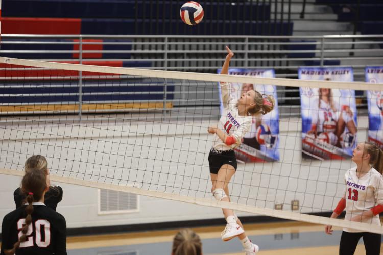 Senior Avery Kort helped lead Oglethorpe County to the second round of the Class A Division I tournament with this spike in a victory over Rabun County. (CASSIDY HETTESHEIMER/THE OGLETHORPE ECHO)
