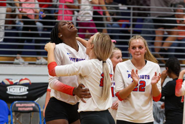 Junior Kenzie Henderson and senior Madi Kelley celebrates after the final point of its first-round state playoff win over Rabun County on Wednesday, Oct. 18, 2023, in Lexington, Georgia (Photo/Cassidy Hettesheimer).