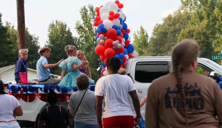 Members of homecoming court wave to spectators on the parade route during the OCHS homecoming parade on Thursday, Sept. 21, 2023. (Photo/Cassidy Hettesheimer)