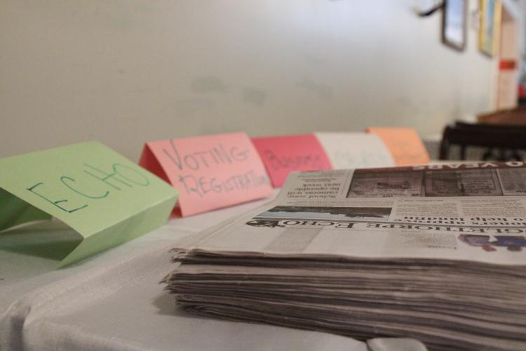 A table with extra copies of the Oglethorpe Echo, voter registration forms. Mary Nouri envisioned the meet and greet as an opportunity to funnel newer residents towards resources available in and around the city of Arnoldsville. (photo/ Elena Acosta)