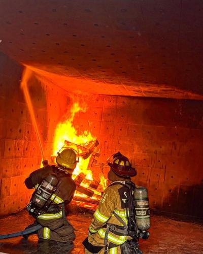 Firefighters had to suppress flames during a live fire training held in 2022 at the Athens-Clarke County Fire Training Center./SUBMITTED PHOTO