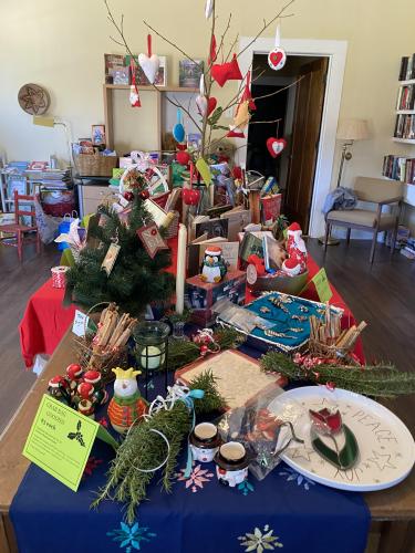 Goods are displayed in preparation for the Christmas Bazaar and book sale on Nov. 29, 2021. (Courtesy/Babs DeArmond)