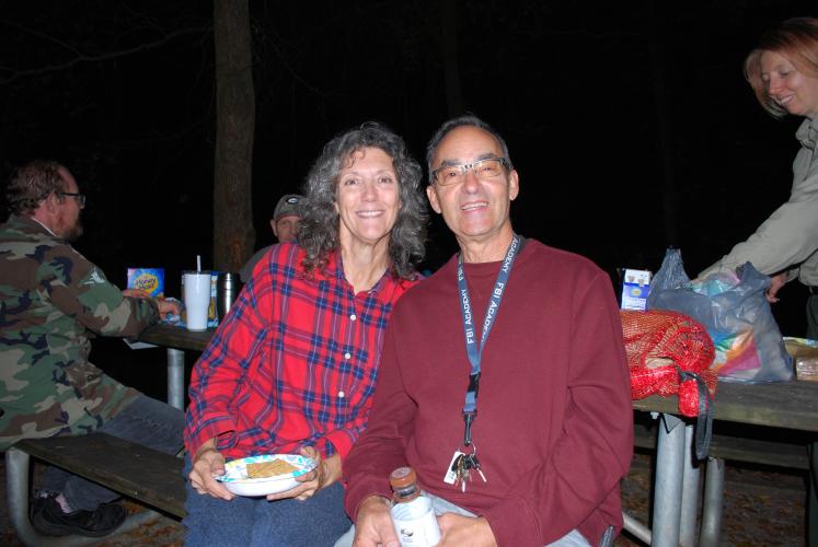 Watson Mill Bridge State Park campsite hosts David and Sandra Dyhouse sit at the s’mores preparation table waiting for their turn to roast their marshmallows. The job of a campsite host is to typically assist campground guests and visitors, while maintaining the cleanliness of the campground.