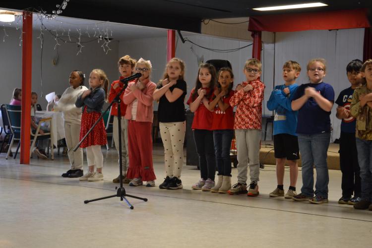 Oglethorpe County Primary School's music teacher, Carly Haunts, choreographed hand movements to accompany each song. For example, when singing how the second graders love the U.S.A. they held their hands close to their hearts. (Grace Mains/The Oglethorpe Echo)