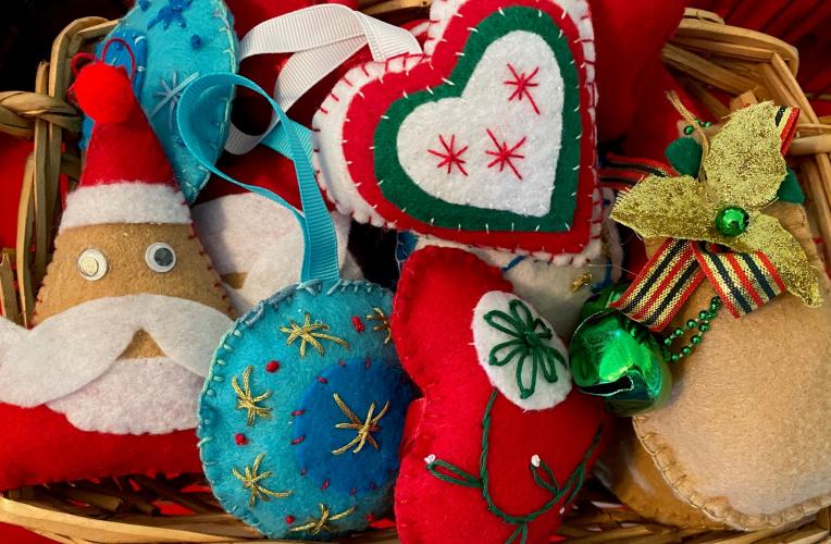 Goods are displayed in preparation for the Christmas Bazaar and book sale on Nov. 29, 2021. (Courtesy/Babs DeArmond)
