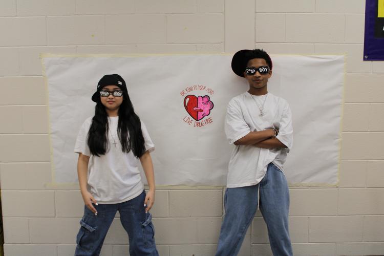 Amy Vu and Elijah Jackson posed with Soulja Boy outfits. The two eighth graders took the opportunity to dress up in costume together in one of the rapper’s iconic looks. (Photo/Caleb Baldwin)