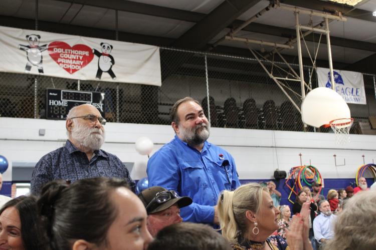 Veterans stood and received applause as they were recognized by the community at the second graders' performance. They were honored with a series of patriotic songs by the students. (Caleb Baldwin/The Oglethorpe Echo)
