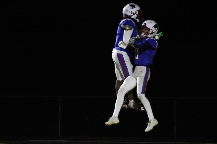 Jordan Johnson (left) and Caden Hartrum celebrating after Hartrum scored his only touchdown of the night. (Lauren Hill/The Oglethorpe Echo)