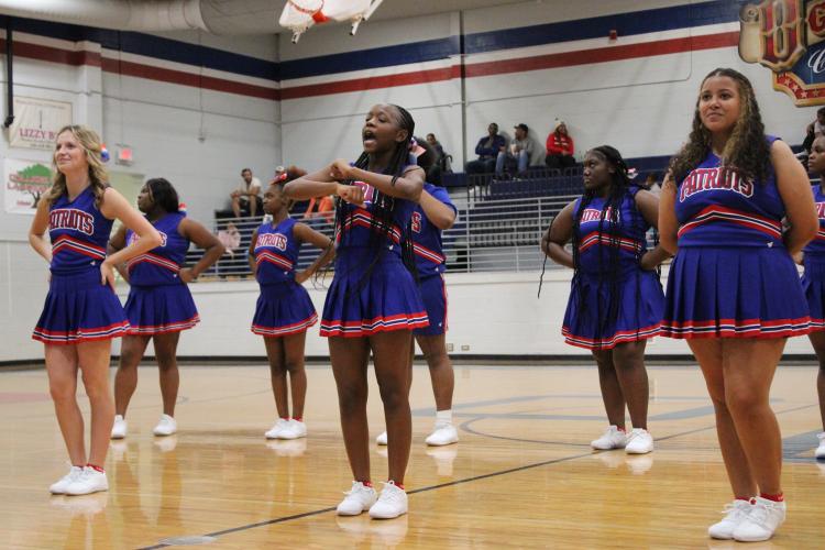The OCHS basketball cheer team performs during halftime of the scrimmage against Hart County. The Patriots open the season in the Billy Wade Classic at Clarke Central on Nov. 20 and 21. (LAUREN HILL/THE OGLETHORPE ECHO) 