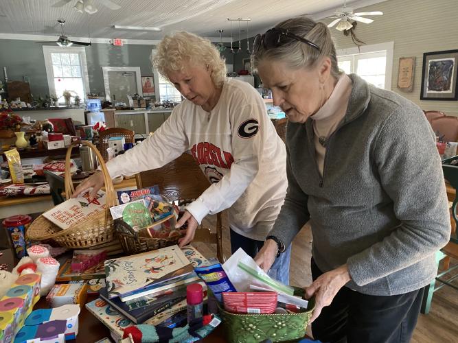 The Friends of the Library prepare for the annual Christmas Bazaar and book sale on Nov. 28, 2023. (Courtesy/Babs DeArmond)