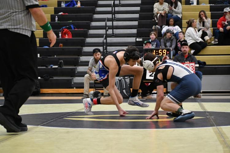 Aiden Dellinger and his opponent size up each other during their semifinal matchup. OCHS defeated the Blue Devils 36-33 and are the eighth seed for the Class A dual tournament this weekend. (Wade Cheek/For the Oglethorpe Echo)