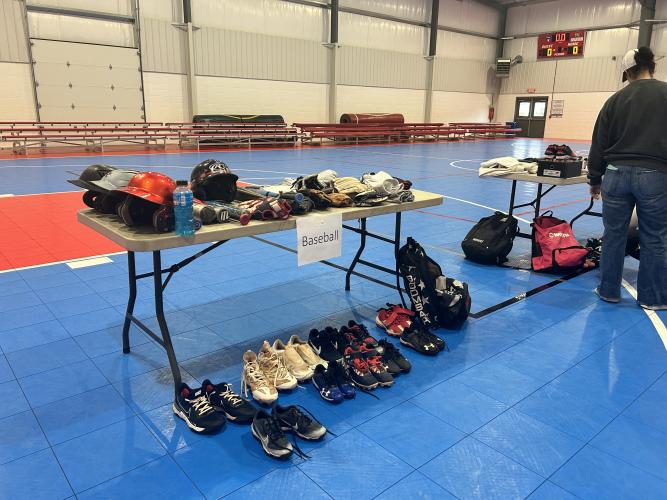 [Photo by Micahya Costen] The baseball table set up in the gym.