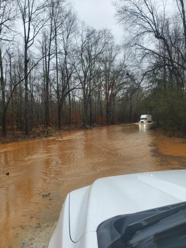 A tractor-trailer truck is stuck in flood waters on Saxon Mattox Road in the northeastern Part of Oglethorpe County. Some parts of the county received more than 3 inches of rain on Monday night and Tuesday. (Submitted Photo)