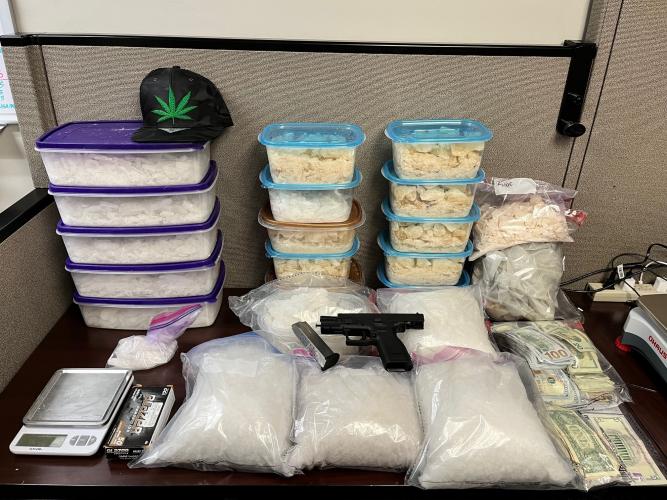 86 pounds of methamphetamine along with a Springfield 9 mm handgun and $32,000 seized. (Submitted Photo)