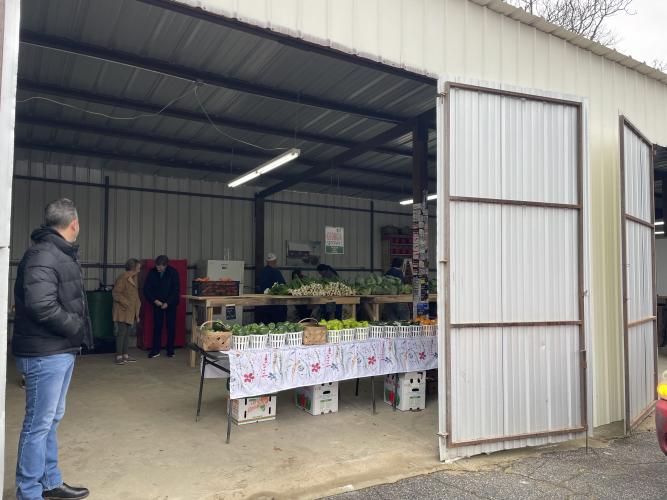 Strickland Pride Produce's new location is fully enclosed but can be an open-air shop when its doors are open. Kendall Strickland, owner of the shop, hoped to protect himself and shoppers from the elements when purchasing the building. (Margaux Binder/The Oglethorpe Echo)