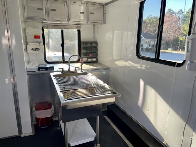 Inside the trailer unit the Madison Oglethorpe Animal Shelter will be using for their free vaccine clinic. The unit is equipped with a surgical light, examination table and more. (Lee Short/The Oglethorpe Echo)