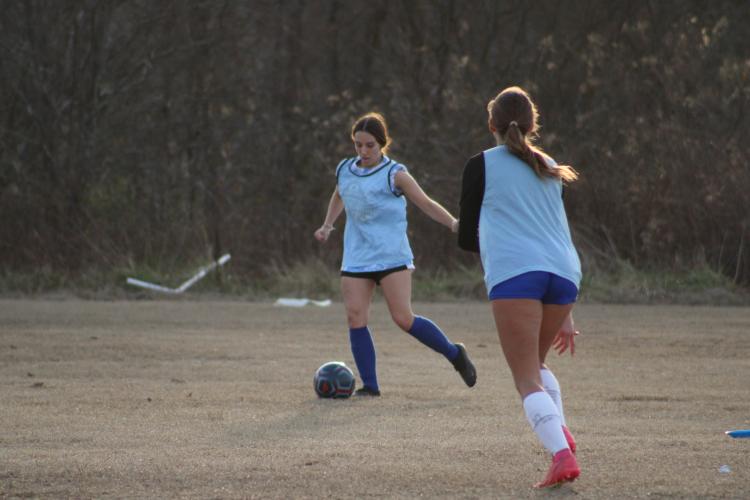 Madeline Forschler prepares to pass the ball during Oglethorpe Counties girls soccer team's practice on Thursday, Feb. 1. The junior defender was named one of four captains for the upcoming season. (Photo/Owen Warden)
