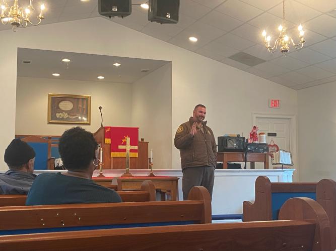 Oglethorpe County Sheriff David Gabriel speaks to residents concerning safety techniques in the event of an emergency Jan. 21 at St. John's Ame Church. (Sydney Bishop/The Oglethorpe Echo)