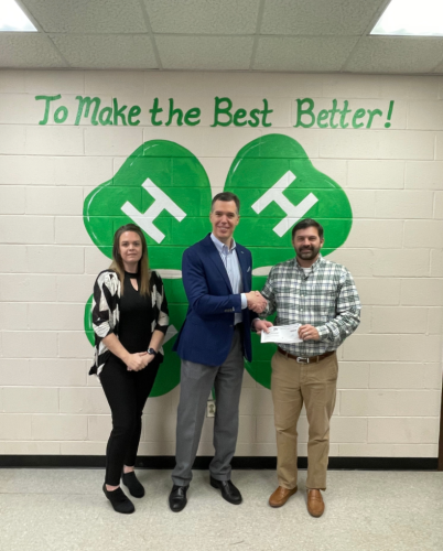 The Commercial Bank CEO Mike Sale (middle), meets with 4-H Americorps volunteer Kayla Latimer (left) and Oglethorpe County 4-H Agent Marcus Eason (right) to present a donation check to Oglethorpe County 4-H. The Commercial Bank gave the donation to celebrate the 100th anniversary of the local business. (Submitted Photo)