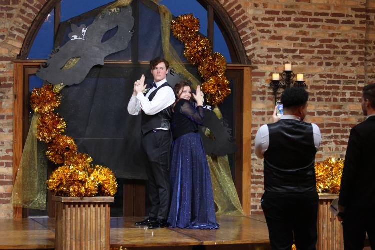 David McCoy and Natalie Goodin appear all business as they pose for a photo during the Oglethorpe County High School Prom at Historic Smithonia Farm in Colbert, Georgia on April 20, 2024. (Photo/Jim Bass)