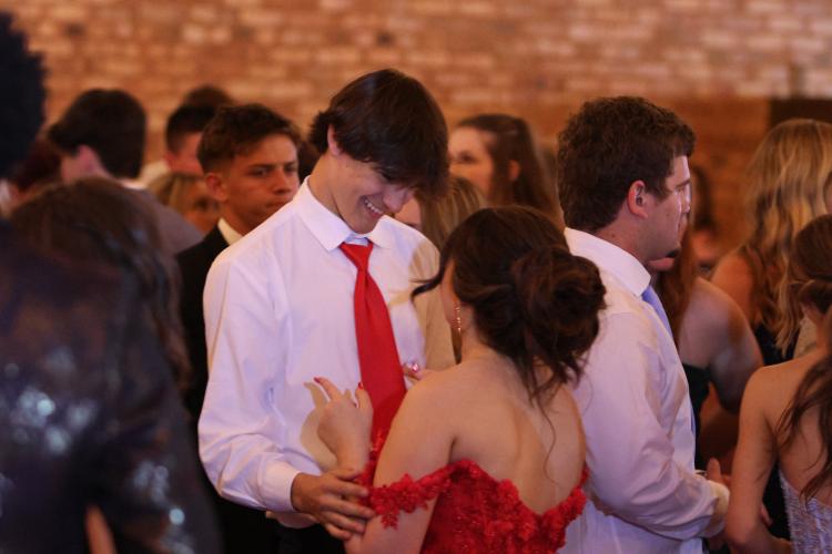 Ethan Dodd and Macie McDaniel smile at each other during the Oglethorpe County High School Prom at Historic Smithonia Farm in Colbert, Georgia on April 20, 2024. (Photo/Jim Bass)