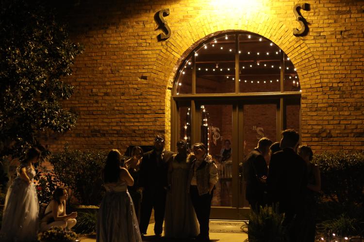 Students wait for their rides and take photos outside of the Oglethorpe County High School Prom at Historic Smithonia Farm in Colbert, Georgia on April 20, 2024. (Photo/Jim Bass)