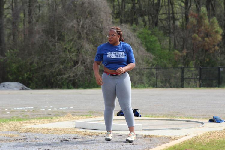 Zy’Kieria Edwards works on throwing the shot during Oglethorpe County track practice last week. (Samuel Higgs/The Oglethorpe Echo)