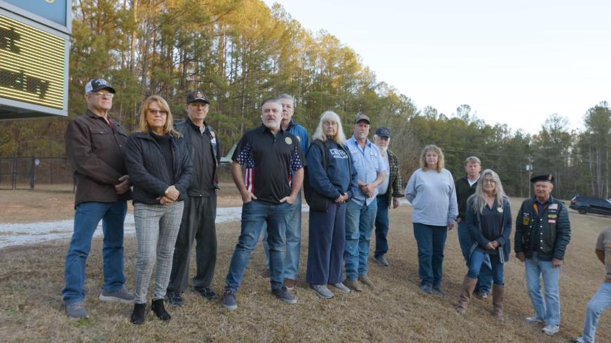 Members of The American Legion Post 123 and the Sons of the American Legion pose outside for a recruitment video. The video was produced by Matt Chastain (fourth from left) and features Squadron Adjutant George Gray (far left). (Submitted Photo)
