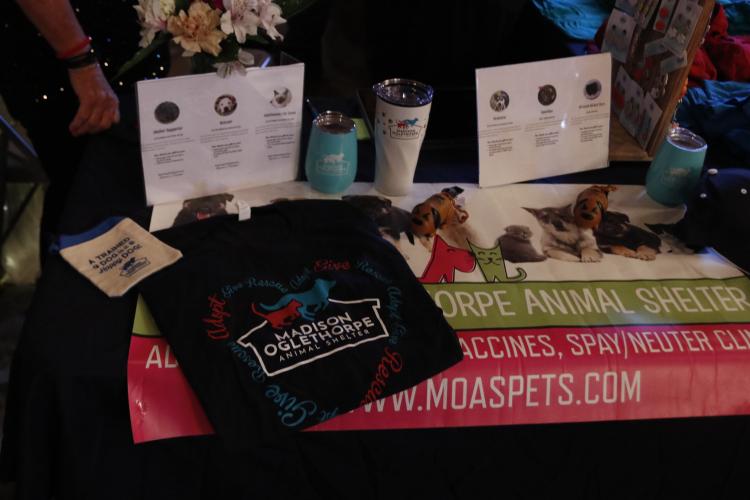 Sherrie Hines, MOAS Board Member and Bark &amp; Wine coordinator, estimates that the event raised around $20,000 this year from tickets and merchandise sales. (Torin Smith/The Oglethorpe Echo)