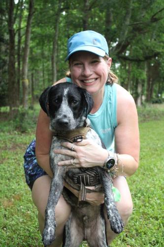 Danielle Cheek ran the 5K alongside her dog Ratchet.(Sarah Coyne/The Oglethorpe Echo)