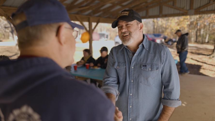 George Gray (left) shakes Matt Chastain's (right) hand as they reenact how they met for a recruitment video for the Sons of the American Legion. (Submitted Photo)