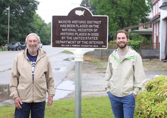 Maxeys Mayor Warren Gilson (left) and Mark Beatty, a member of the Northeast Georgia Regional Commission, dedicate the historical marker that commemorates the city being included on the National Register of Historic Places. Maxeys was added to the list in 2022. (Sarah Coyne/The Oglethorpe Echo)